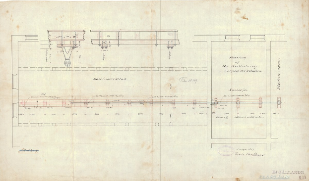 Detailzeichnung einer Eisenbahnschiene auf Papier, einschließlich Schienen, Lokomotiven und anderen Komponenten, mit begleitendem erklärendem Text.