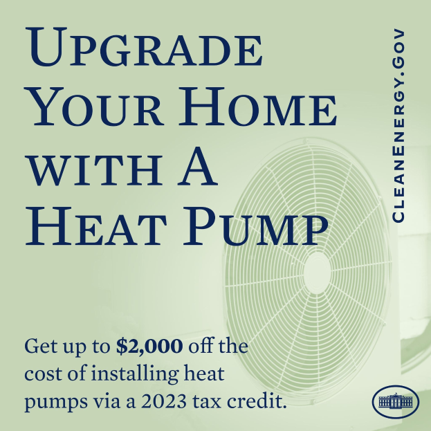 Plakat wirbt für den Austausch von Heizungen zu Wärmepumpen, zeigt ein Bild einer Wärmepumpe und den Text "Upgrade Your Home with a Heat Pump."